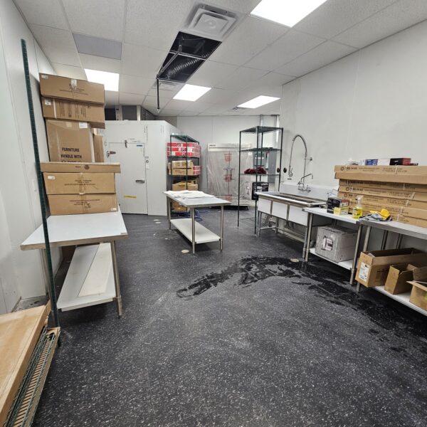 Commercial contractor working on a restaurant kitchen fit-out